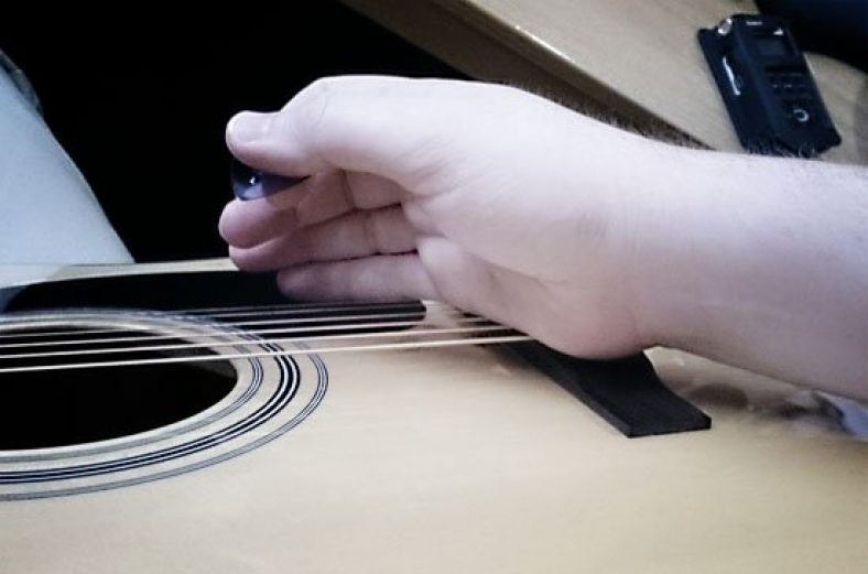 How To Play Acoustic Guitar Quietly Tips & Products To Use Right Now